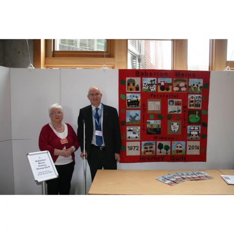 Dave Macleod MSP and Muriel Adam with quilt