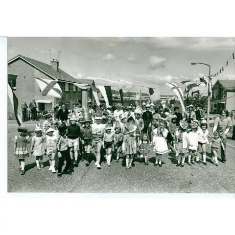 Folk enjoying a street party on Baberton Mains Terrace