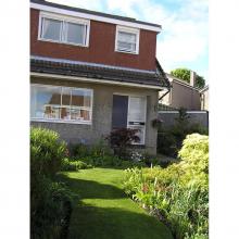 Semi-detached chalet with mature garden ( front lawn and shrubs)