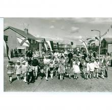 Folk enjoying a street party on Baberton Mains Terrace